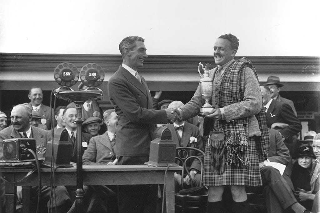 Tommy Armour receives the Claret Jug in 1931